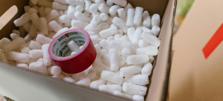 packing peanuts and tape, which are some of the things to consider when moving across the country