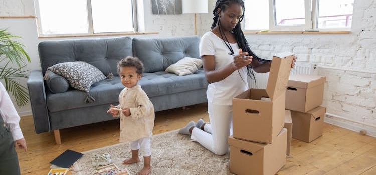 a woman about to pack with a toddler