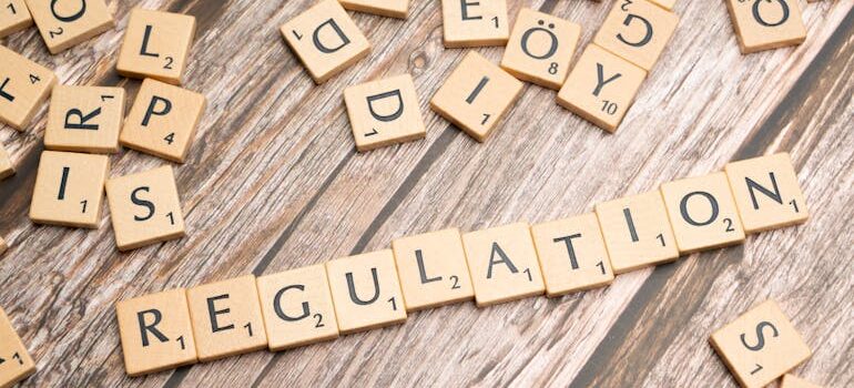 "regulations" written by scrabble letters