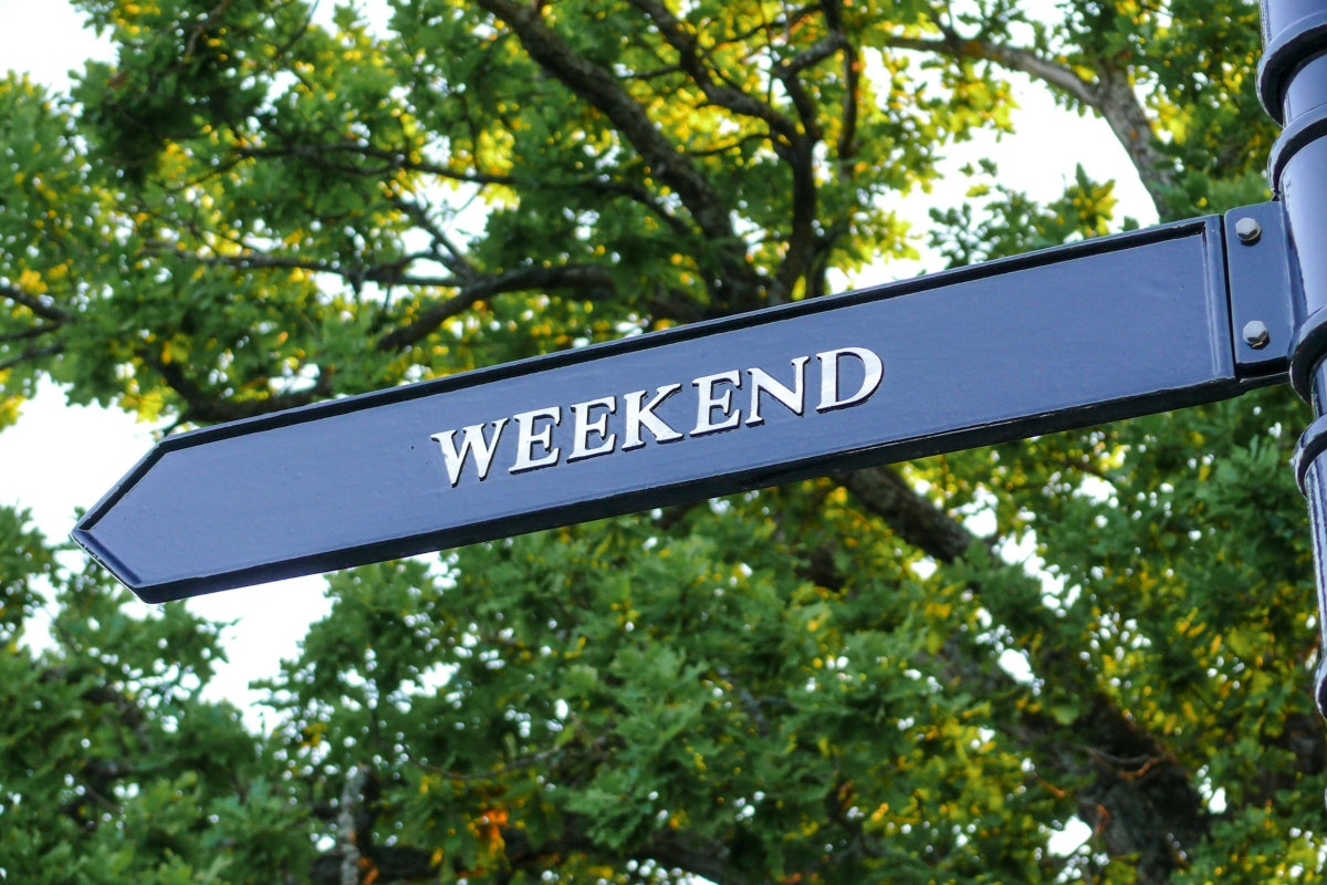 weekend written on a signpost