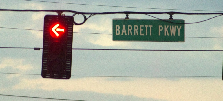 Sign hanging at the intersection of Barrett Parkway and US Highway 41.