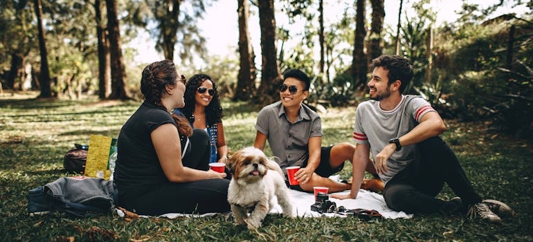 a group of friends having a picnic enjoying one of the best Georgia weekend getaways