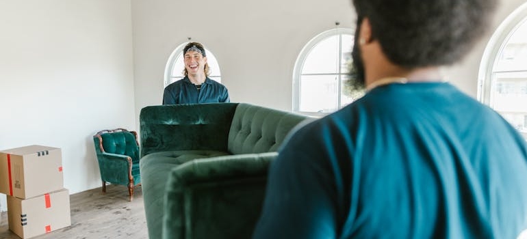 movers lifting a sofa