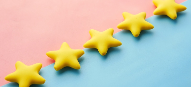 yellow stars on a blue & pink background