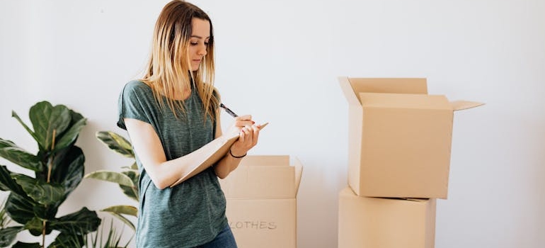 a woman with a home setup checklist