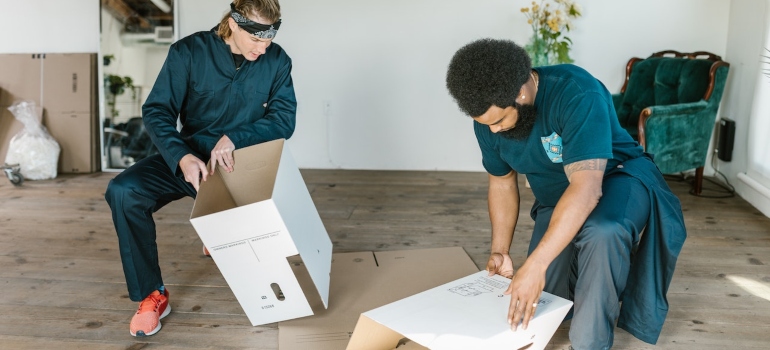 two movers dealing with export packaging