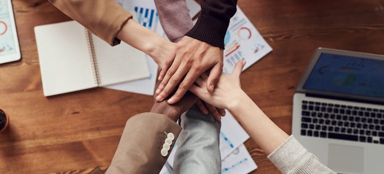 people crossing hands