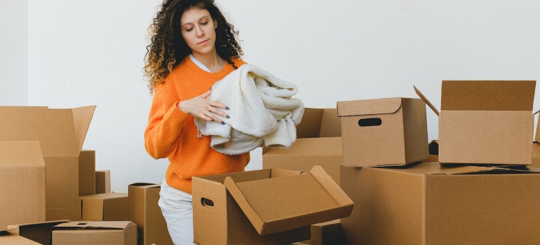 a person packing for the move