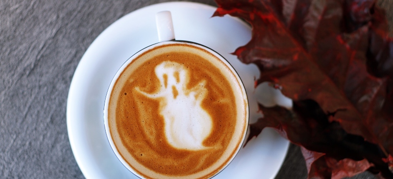 a coffee with a ghost decoration