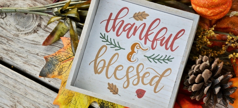 thankful and blessed written in a decorative box