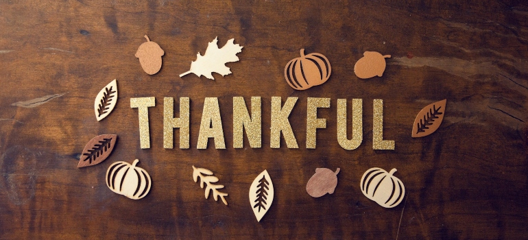 thankful letters surrounded by leaves - perfect to decorate a home for Thanksgiving 