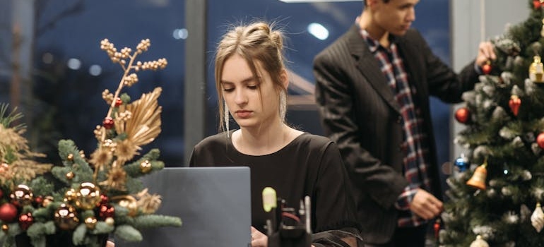 two people in a decorated office